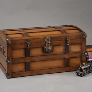 Steamer trunk with model train in front