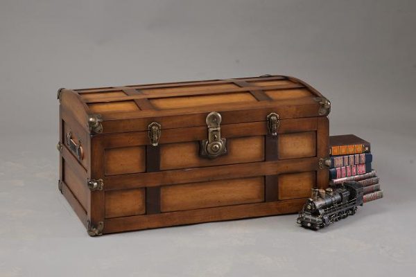 Steamer trunk with model train in front