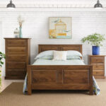 Three-piece wooden bedroom set with walnut finish