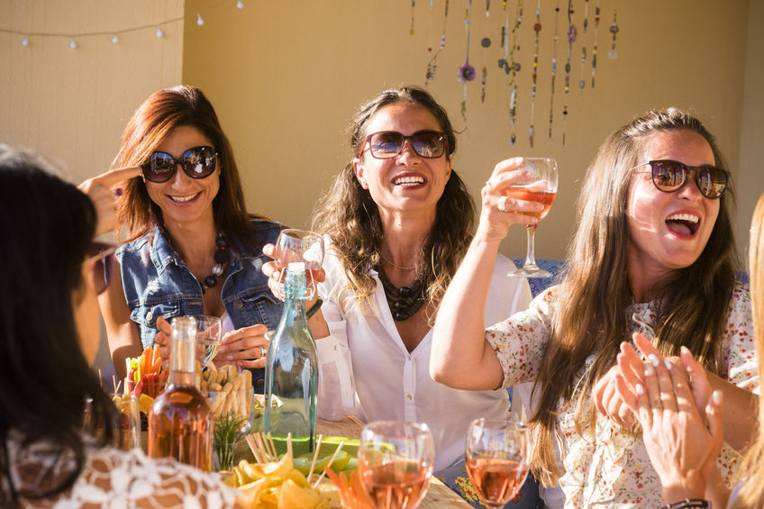 women enjoying brunch together at a table